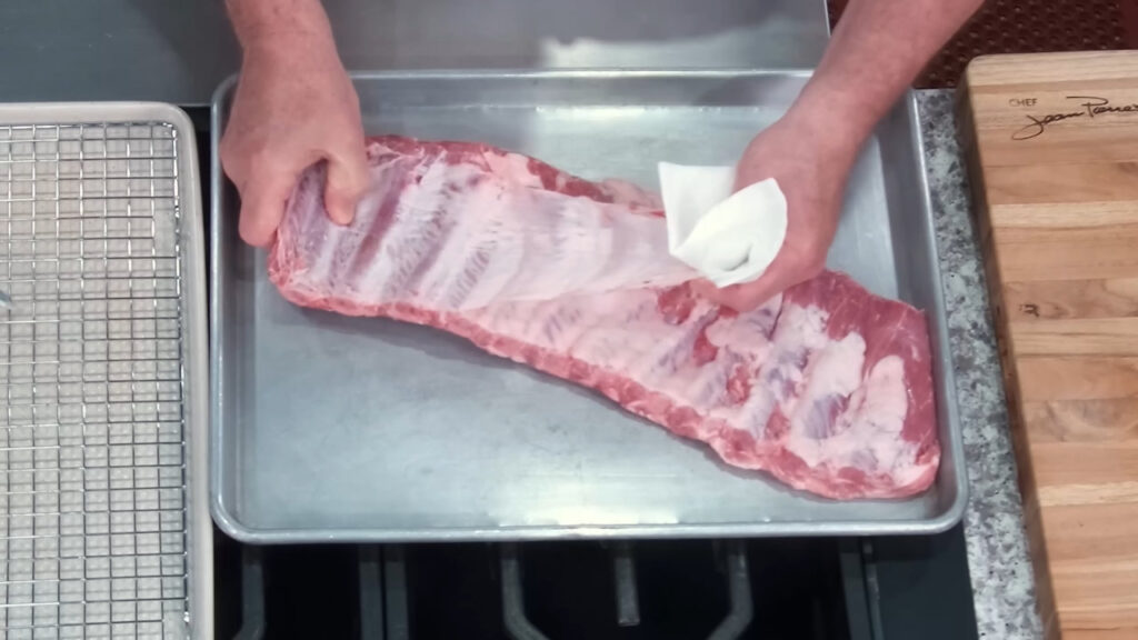 Remove membrane before dry rubbing your BBQ Ribs Recipe