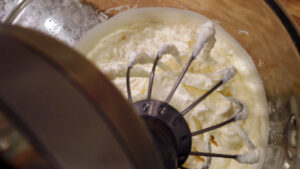 How to Make French Butter - whipped cream begins to separate and form lumps